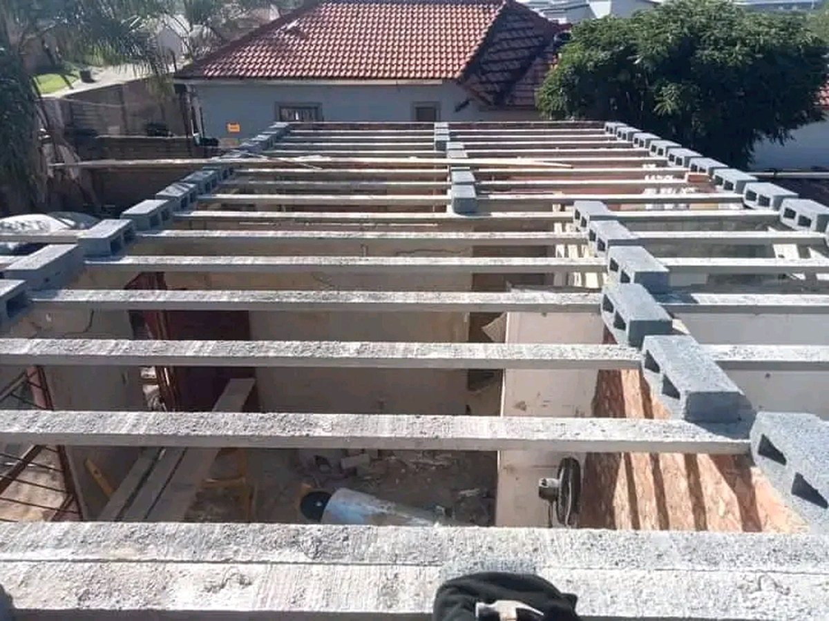 Roof beam and lintel framework with wooden support structure